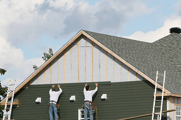 Professional Siding technician working in Church Hill, MD